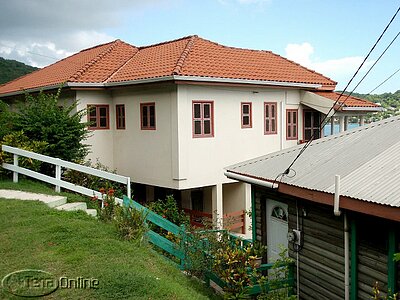 Main building with guest cottage