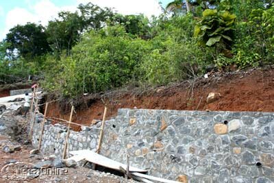 Sturdy stone retaining walls where necessary